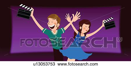 Man with a woman holding film slates in a movie theater View Large Photo Image Stock Image - Man with a woman holding film slates in a movie theater. Fotosearch