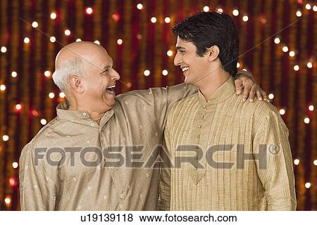 Man with his son View Large Photo Image Stock Photo - Man with his son. Fotosearch
