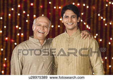Man with his son View Large Photo Image Stock Photo - Man with his son. Fotosearch