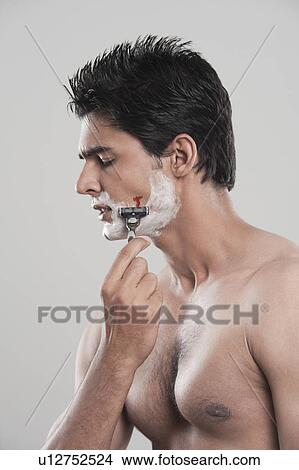 Man with shaving cut View Large Photo Image Picture - Man with shaving cut. Fotosearch