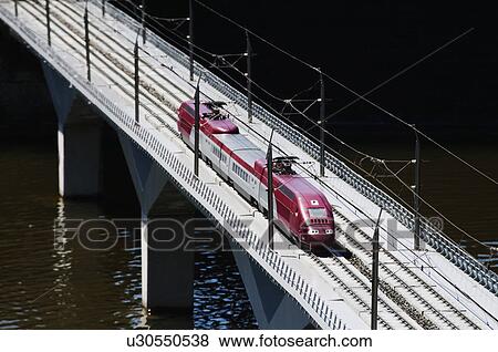 Stock Photo - Miniature electric train in a miniature city, Madurodam, Scheveningen, The Hague, Netherlands. Fotosearch
