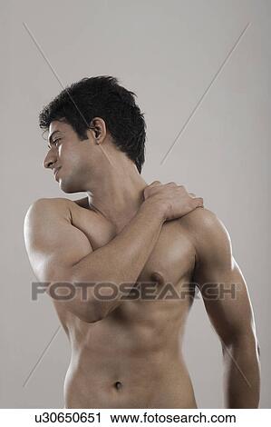 Muscular man suffering from backache View Large Photo Image Stock Image - Muscular man suffering from backache. Fotosearch