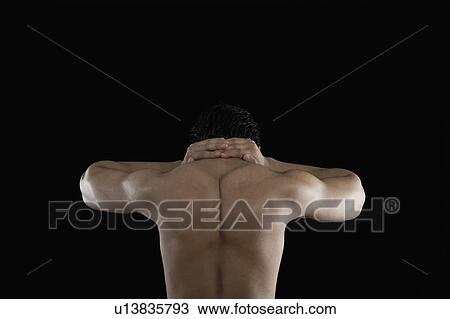 Muscular man suffering from neckache View Large Photo Image Stock Image - Muscular man suffering from neckache. Fotosearch