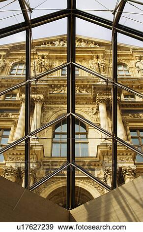 Museum viewed from the glass of a pyramid, Louvre Pyramid, Musee du Louvre, Paris, France View Large Photo Image Stock Photo - Museum viewed from the glass of a pyramid, Louvre Pyramid, Musee du Louvre, Paris, France. Fotosearch