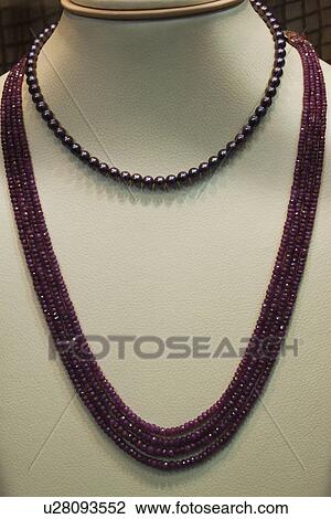 Stock Image - Necklace on display in a jewelry store, New Delhi, India. Fotosearch