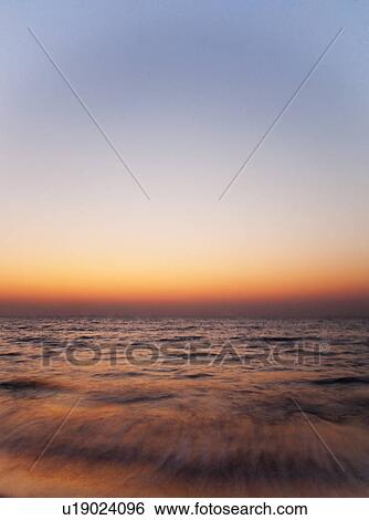 Panoramic view of the sea at dusk, Goa, India View Large Photo Image Stock Photograph - Panoramic view of the sea at dusk, Goa, India. Fotosearch