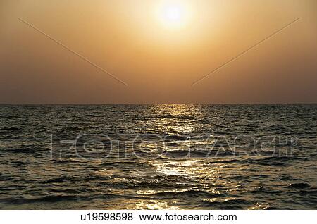 Panoramic view of the sea at sunset, Goa, India View Large Photo Image Stock Photo - Panoramic view of the sea at sunset, Goa, India. Fotosearch