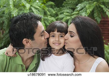 Parents kissing their daughter View Large Photo Image Stock Image - Parents kissing their daughter. Fotosearch