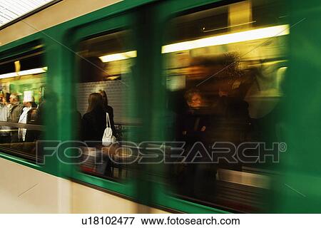 Passengers in a train, Paris, France View Large Photo Image Stock Photo - Passengers in a train, Paris, France. Fotosearch