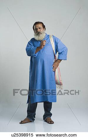 Philosopher standing with his hand on his hip View Large Photo Image Stock Photography - Philosopher standing with his hand on his hip. Fotosearch