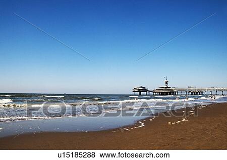Stock Photo - Pier on the beach, Scheveningen, The Hague, Netherlands. Fotosearch