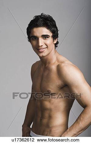Portrait of a bare chested man smiling View Large Photo Image Stock Image - Portrait of a bare chested man smiling. Fotosearch