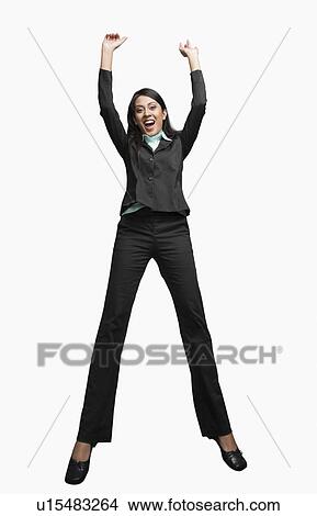 Picture - Portrait of a businesswoman cheering. Fotosearch