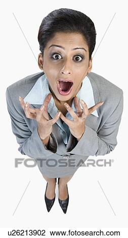 Portrait of a businesswoman looking surprise View Large Photo Image Stock Image - Portrait of a businesswoman looking surprise. Fotosearch
