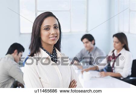 Portrait of a businesswoman smiling View Large Photo Image Stock Photograph - Portrait of a businesswoman smiling. Fotosearch