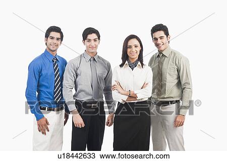Stock Image - Portrait of a businesswoman with her colleagues. Fotosearch