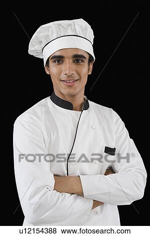 Portrait of a chef smiling View Large Photo Image Stock Photo - Portrait of a chef smiling. Fotosearch