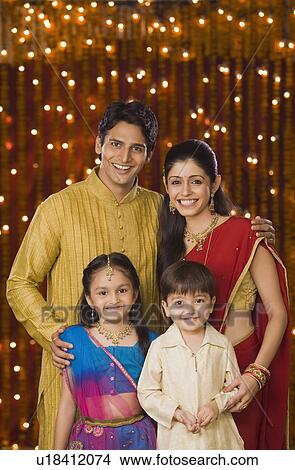 Portrait of a family smiling View Large Photo Image Picture - Portrait of a family smiling. Fotosearch