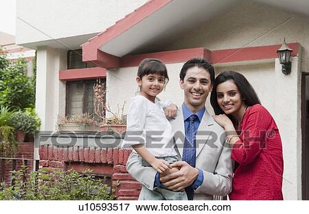 Portrait of a family smiling View Large Photo Image Stock Photo - Portrait of a family smiling. Fotosearch