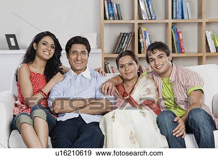 Stock Photo - Portrait of a family smiling. Fotosearch