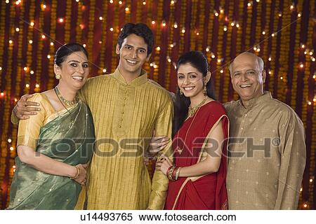 Stock Photography - Portrait of a family smiling. Fotosearch
