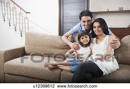 Portrait of a family smiling together View Large Photo Image Stock Image - Portrait of a family smiling together. Fotosearch