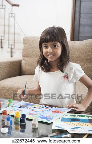 Portrait of a girl painting View Large Photo Image Stock Photography - Portrait of a girl painting. Fotosearch
