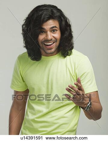 Stock Image - Portrait of a man gesturing. Fotosearch