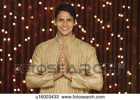 Stock Image - Portrait of a man greeting. Fotosearch