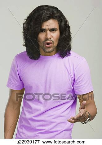 Portrait of a man looking serious View Large Photo Image Stock Photo - Portrait of a man looking serious. Fotosearch