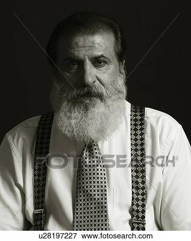 Portrait of a man looking serious View Large Photo Image Stock Photo - Portrait of a man looking serious. Fotosearch