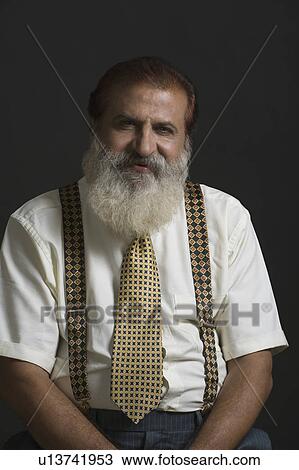 Portrait of a man smiling View Large Photo Image Stock Image - Portrait of a man smiling. Fotosearch