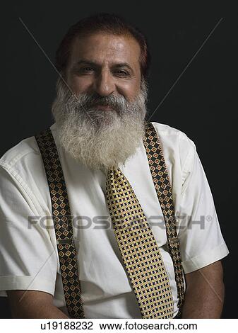 Stock Image - Portrait of a man smiling. Fotosearch
