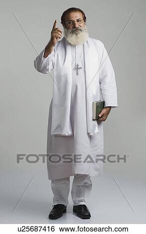 Portrait of a priest View Large Photo Image Stock Photograph - Portrait of a priest. Fotosearch