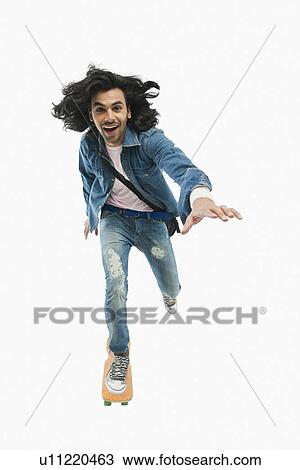 Portrait of a university student skateboarding View Large Photo Image Stock Image - Portrait of a university student skateboarding. Fotosearch