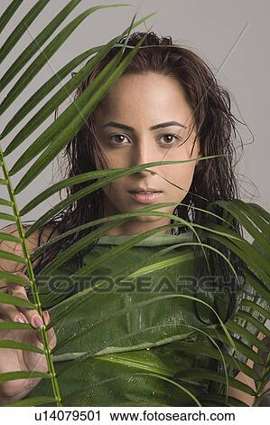Stock Image - Portrait of a woman getting spa treatment. Fotosearch