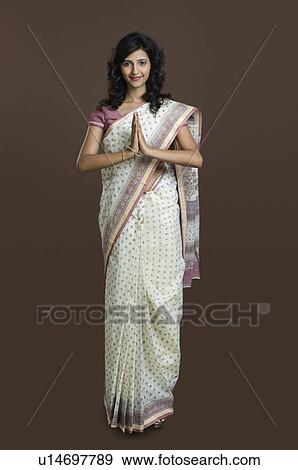 Portrait of a woman greeting View Large Photo Image Stock Photo - Portrait of a woman greeting. Fotosearch