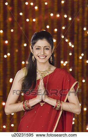 Stock Photography - Portrait of a woman greeting. Fotosearch