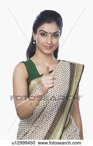 Portrait of a woman pointing forward View Large Photo Image Stock Image - Portrait of a woman pointing forward. Fotosearch
