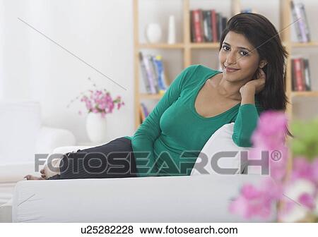 Stock Photo - Portrait of a woman smiling. Fotosearch