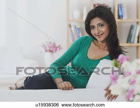 Portrait of a woman smiling View Large Photo Image Stock Photograph - Portrait of a woman smiling. Fotosearch