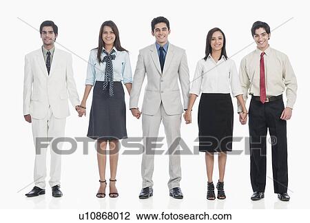 Portrait of business executives standing together View Large Photo Image Stock Image - Portrait of business executives standing together. Fotosearch