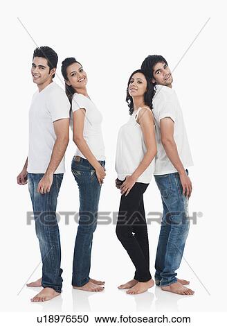 Stock Image - Portrait of two couples smiling. Fotosearch