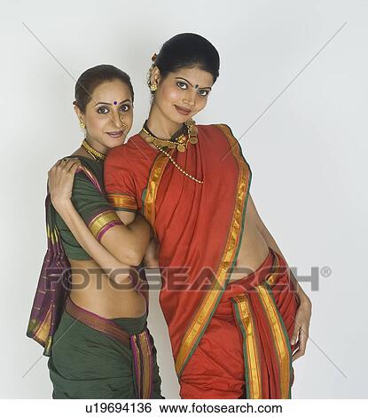 Portrait of two female folk dancers posing View Large Photo Image Stock Photograph - Portrait of two female folk dancers posing. Fotosearch