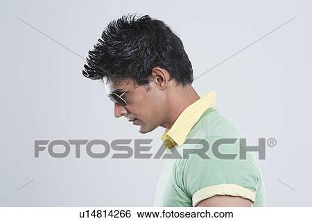 Profile of a man wearing goggles View Large Photo Image Stock Photograph - Profile of a man wearing goggles. Fotosearch