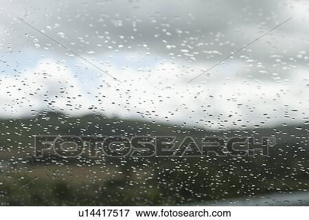 Rain drops on the windshield of a car, Dublin, Republic of Ireland View Large Photo Image Stock Photo - Rain drops on the windshield of a car, Dublin, Republic of Ireland. Fotosearch