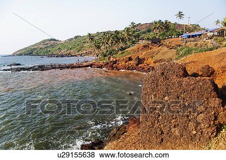 Rock formations on the coast, Goa, India View Large Photo Image Stock Photo - Rock formations on the coast, Goa, India. Fotosearch