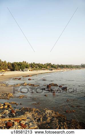 Stock Image - Rocks on the beach, Goa, India. Fotosearch