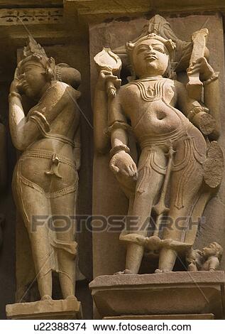 Sculptures on a temple, Lakshmana Temple, Khajuraho, Chhatarpur District, Madhya Pradesh, India View Large Photo Image Picture - Sculptures on a temple, Lakshmana Temple, Khajuraho, Chhatarpur District, Madhya Pradesh, India. Fotosearch
