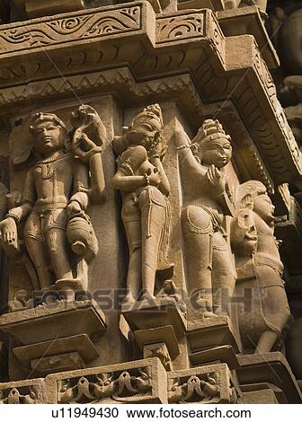 Sculptures on a temple, Lakshmana Temple, Khajuraho, Chhatarpur District, Madhya Pradesh, India View Large Photo Image Stock Image - Sculptures on a temple, Lakshmana Temple, Khajuraho, Chhatarpur District, Madhya Pradesh, India. Fotosearch